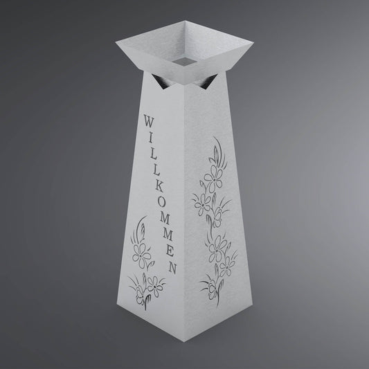 zwei Seitenteile einer Blumensäule aus Metall, die linke Seite mit dem Schriftzug Willkommen und einer kleinen Blumen, rechte Seite eine Große Blumenranke.