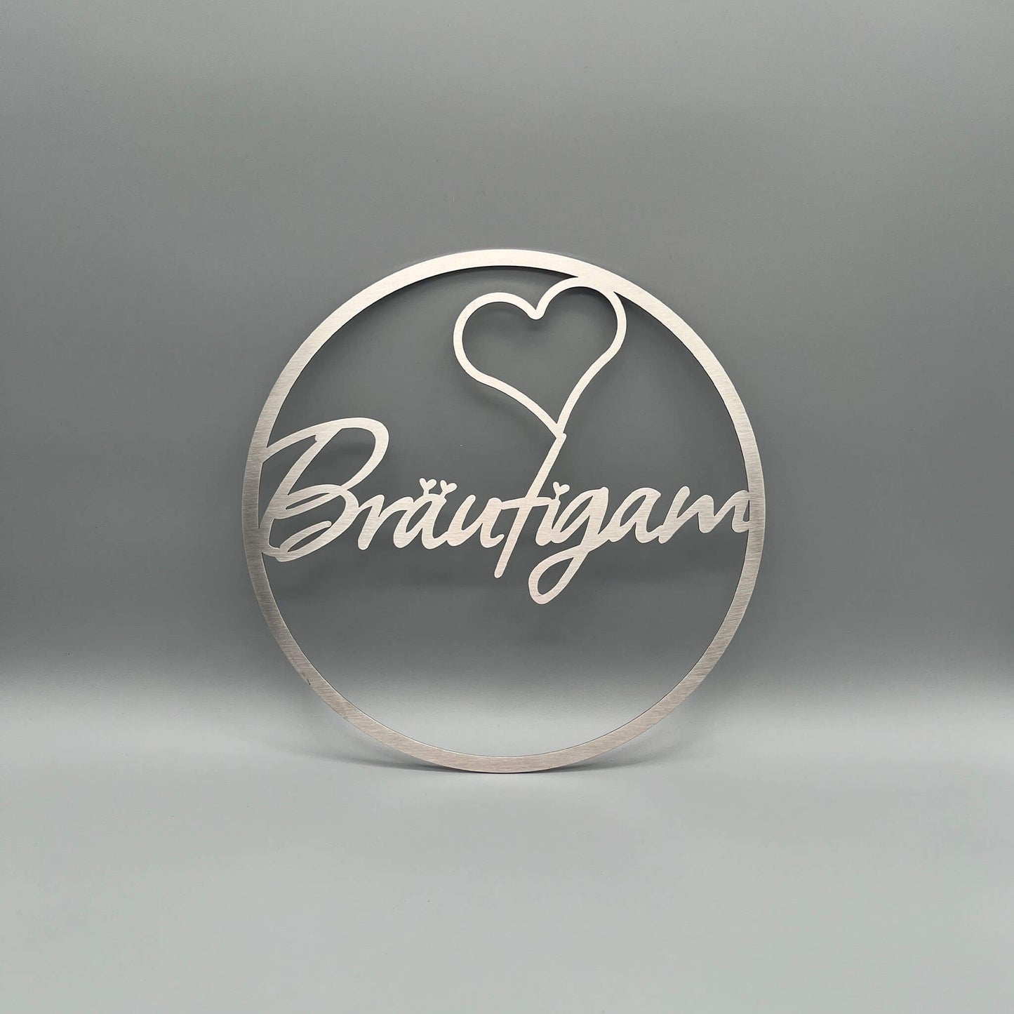 Kranz Bräutigam, Ring mit Innenschrift und Herz.