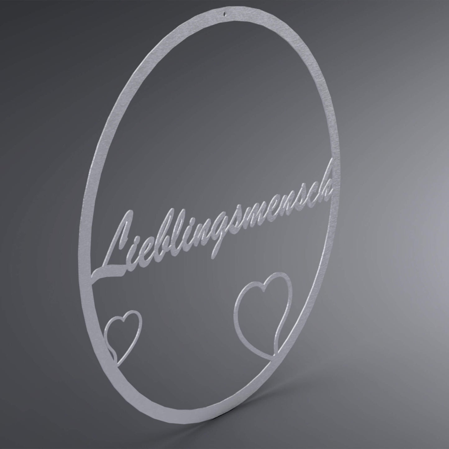 Dünner, ausgehöhlter Kranz. In der Mitte steht: "Lieblingsmensch". Unten links und rechts befinden sich jeweils ein ausgehöhltes Herz. Seitliche Ansicht.