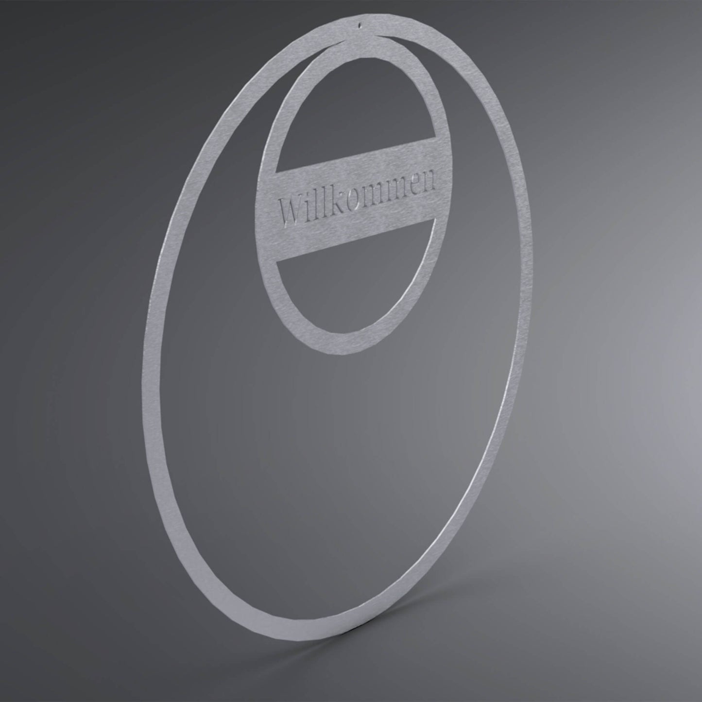 Dünner, ausgehöhlter Kreis. Am oberen Rand ist ein Weiterer Kreis. Im kleinen Kreis steht: "Willkommen" in der Mitte. Seitliche Ansicht.