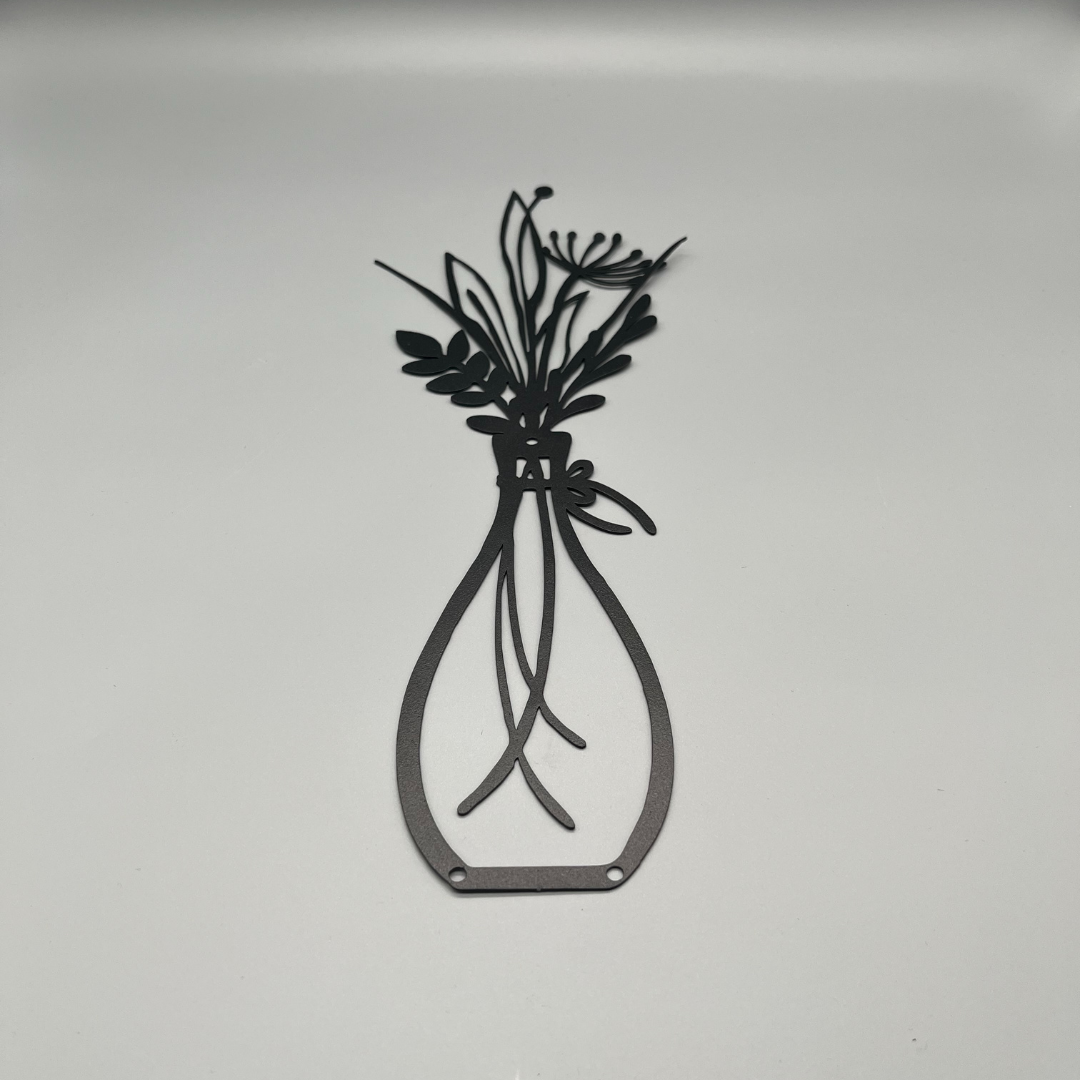 Silhouette einer Vase mit Blumen in Schwarz